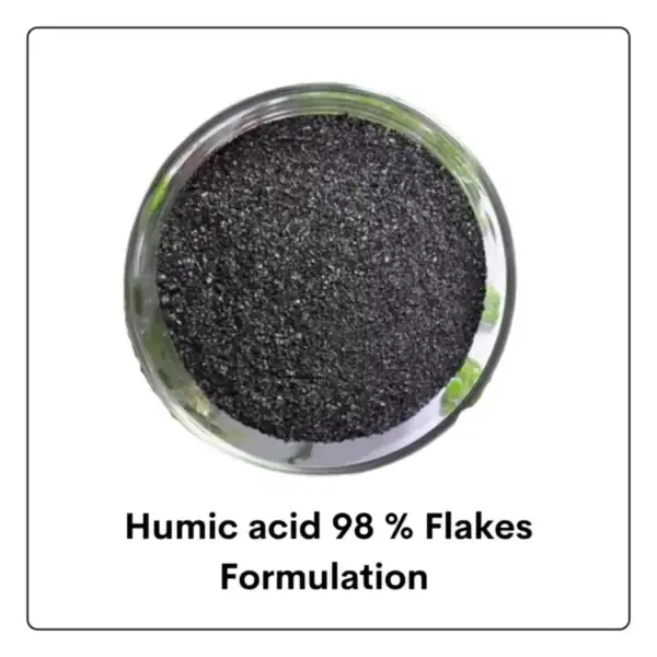Humic acid 98% flakes formulation - black shiny flakes in a glass dish